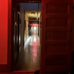 Noble House - It's a long hallway on the 2nd floor to the hotel rooms. Didn't catch any ghosts in our pictures.
