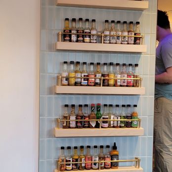Fox And The Hen - Wall of hot sauces - Breakfast & Brunch Near Me - Denver, Colorado
