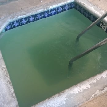 Hyde Park Apartments - a pool with a ladder in it - General Contractors Near Me - Los Angeles, California Hyde Park Apartments - a pool with a ladder in it - General Contractors Near Me - Los Angeles, California