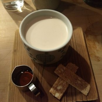 Rintaro - Green tea panna cotta for dessert of course, has green tea syrup that you pour over the top. Served with almond crackers. - Izakaya Near Me - San Francisco, California