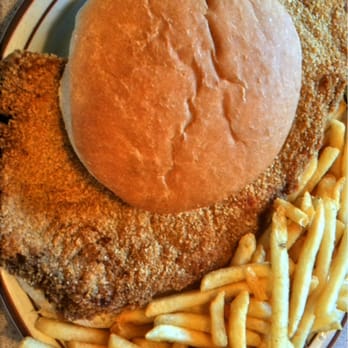 Logue's Restaurant - Giant breaded tenderloin sandwich - American Near Me - Hannibal, Missouri Logue's Restaurant - Giant breaded tenderloin sandwich - American Near Me - Hannibal, Missouri