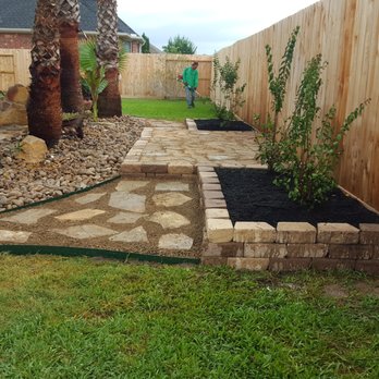 All Seasons Lawn Maintenance - a backyard with landscaping - Lawn Services Near Me - Houston, Texas