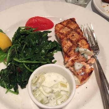 Ouisie's Table - Grilled salmon and spinach with cucumber yogurt. - New American Near Me - Houston, Texas Ouisie's Table - Grilled salmon and spinach with cucumber yogurt. - New American Near Me - Houston, Texas