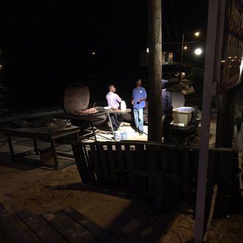Anchor Bay Fish Fry - two men cooking on a grill - Fish & Chips Near Me - Kingston, Ontario