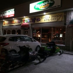 Marco's Pub - Snowmobiles parked in front.... Oh yeah! This is N Quebec! Feb 2015