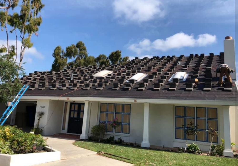 Slide of Jay's Roofing