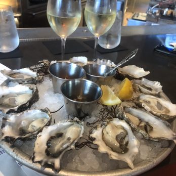 Herringbone Waikiki - Happy hour oysters and sauv blanc - Seafood Near Me - Honolulu, Hawaii