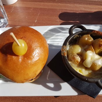 The Bison Restaurant - Bison burger with side of poutine. - Canadian (New) Near Me - Banff, Alberta The Bison Restaurant - Bison burger with side of poutine. - Canadian (New) Near Me - Banff, Alberta