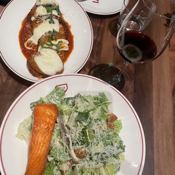 Piatti - Caesar Salad with salmon. Eggplant parmigiana. - Italian Near Me - Seattle, Washington Piatti - Caesar Salad with salmon. Eggplant parmigiana. - Italian Near Me - Seattle, Washington