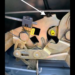 White arrow points to the zip tie the dealer installed and charged me $150.00. White arrow points to the zip tie the dealer installed and charged me $150.00.