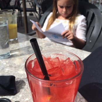 Wild River Grille - Pomegranate lemonade...fresh squeezed. And a cute Roxy in the background. - New American Near Me - Reno, Nevada Wild River Grille - Pomegranate lemonade...fresh squeezed. And a cute Roxy in the background. - New American Near Me - Reno, Nevada