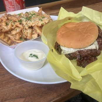 Pleasure Burger - Mushroom and Swiss burger with Parmesan and chive waffle fries. Fries could've used some salt but other than that pretty good. - Burgers Near Me - Portland, Oregon