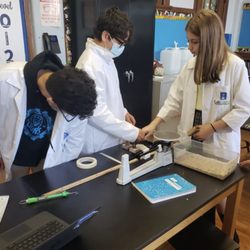 St. Joseph the Worker Catholic Academy - Eighth graders calculating the coefficient of friction.
