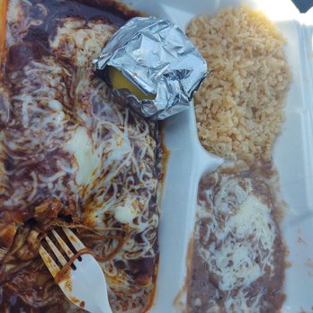 Deli Casa - a plastic container with a fork and rice - Mexican Near Me - Kingsburg, California Deli Casa - a plastic container with a fork and rice - Mexican Near Me - Kingsburg, California