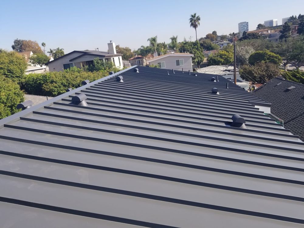 Slide of Tinoco Roofing