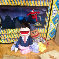 Symposia Bookstore - Puppet window display by Andy Padre.
