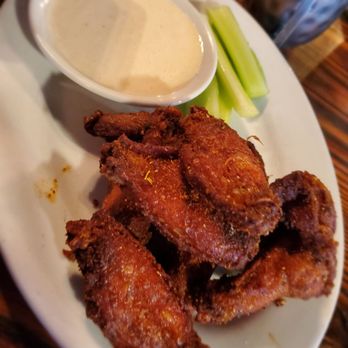 Blind Tiger Pub - Wings appetizer - absolutely delicious! The sauce goes well with the dish - American Near Me - Charleston, South Carolina Blind Tiger Pub - Wings appetizer - absolutely delicious! The sauce goes well with the dish - American Near Me - Charleston, South Carolina