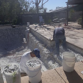 American Pool Plastering - jackhammered non stop to get it done!! it's a huge pool too!! - Pool & Hot Tub Service Near Me - San Fernando, California
