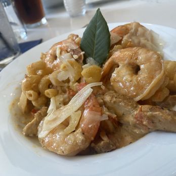 Poets Modern Cocktails and Eats - Cajun shrimp and chicken pasta - New American Near Me - Baltimore, Maryland