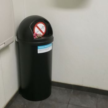 Walgreens - Garbage can in handicap stall inside Walgreens public bathroom. - Drugstores Near Me - Ocala, Florida