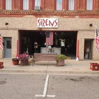 Sirens - the front of a brick building - Bars Near Me - Saint Johns, Michigan