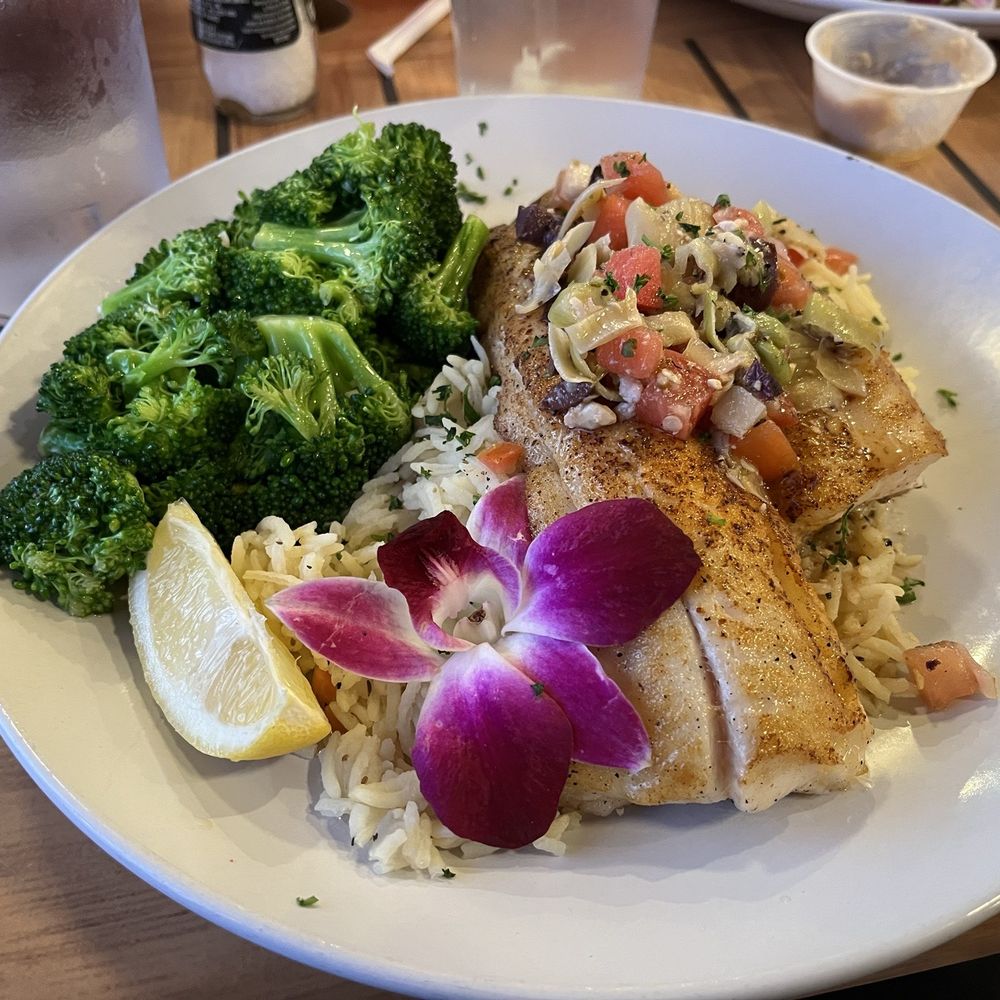 Rusty Hooks Dockside Grill - My Neice and I ordered the blackened flounder with Mediterranean salsa over a bed of seasoned rice. - Seafood Near Me - Southport, North Carolina Rusty Hooks Dockside Grill - My Neice and I ordered the blackened flounder with Mediterranean salsa over a bed of seasoned rice. - Seafood Near Me - Southport, North Carolina