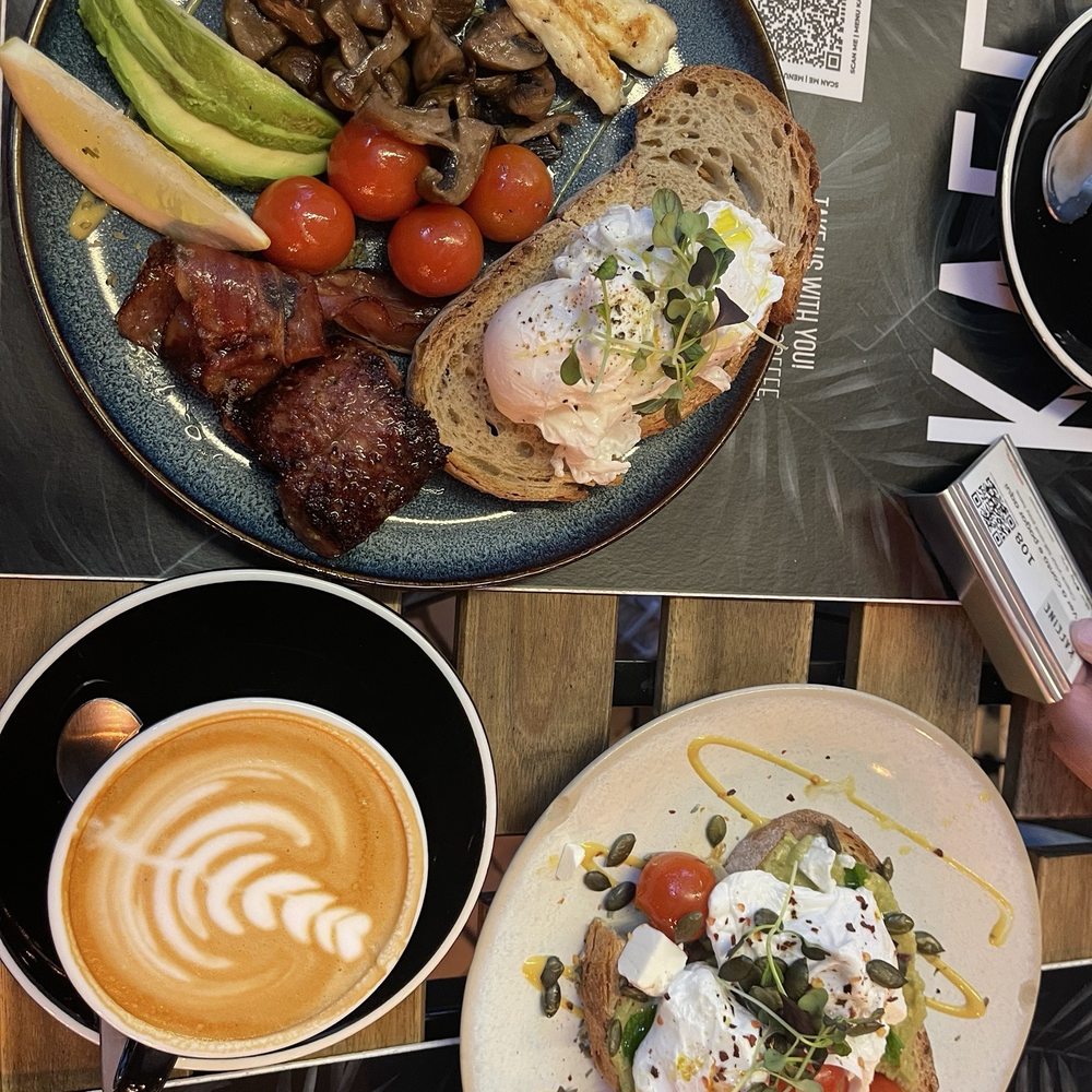 Breakfast plate, cafe latte, Avocado smash Breakfast plate, cafe latte, Avocado smash
