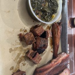 Burnt ends candied pork ribs spicy ver spicy collard greens!