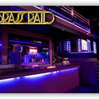 The Brass Rail - a bar with a neon sign - Bars Near Me - Toronto, Ontario