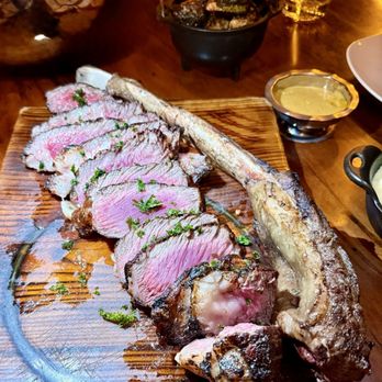 Primal Steakhouse - 50 ounce tomahawk split 3 ways - Steakhouses Near Me - Las Vegas, Nevada