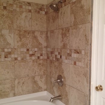 Custom Tile Montclair - a bathtub and shower - Flooring Near Me - Montclair, California