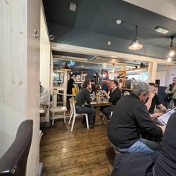 Hooked Seafood Restaurant - Hooked seating of caucasians in their restaurant vs colored patrons.