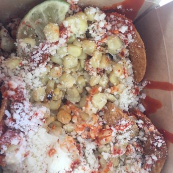 Elote - Tostielote (after having a few bites - before remembering to take a photo) - Mexican Near Me - San Diego, California Elote - Tostielote (after having a few bites - before remembering to take a photo) - Mexican Near Me - San Diego, California