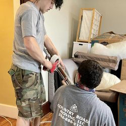 Country Roads Moving - Two of our household packers prepping a house for moving day.