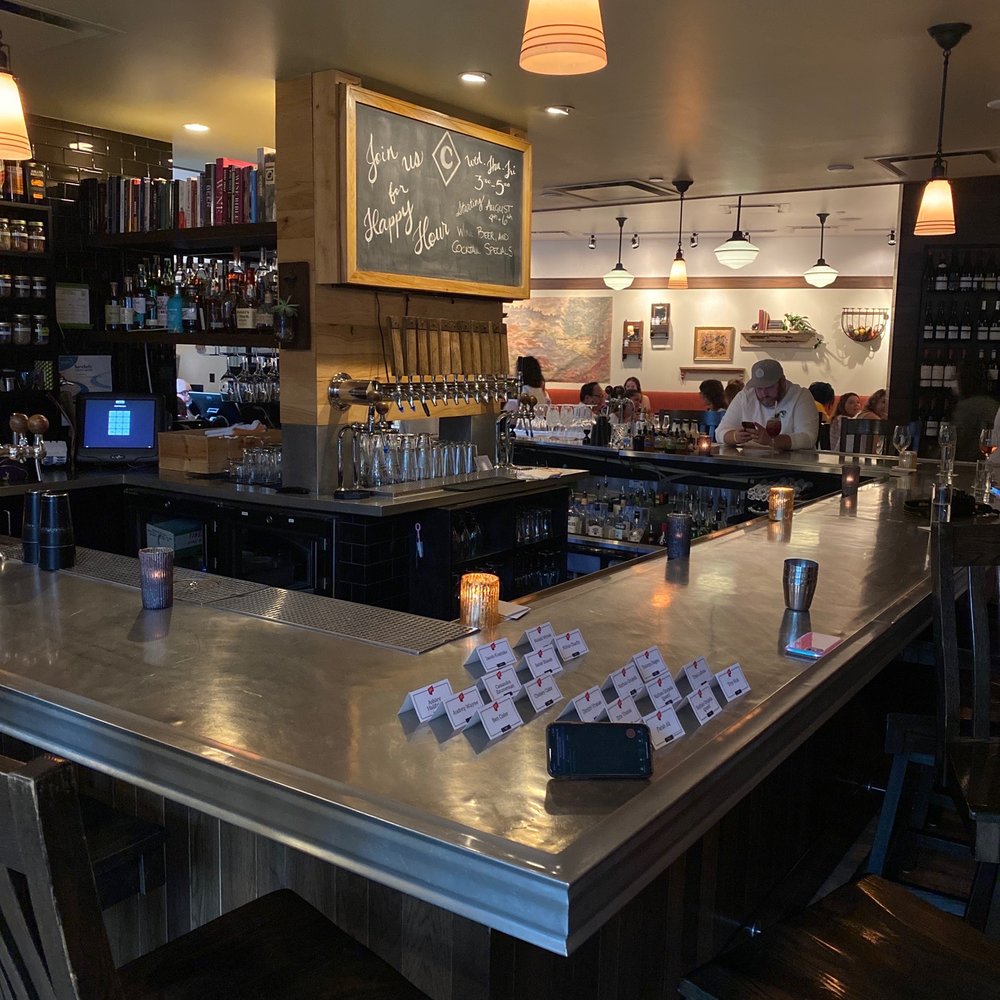 Cadre Restaurant - a bar with a lot of counter space - French Near Me - Madison, Wisconsin Cadre Restaurant - a bar with a lot of counter space - French Near Me - Madison, Wisconsin