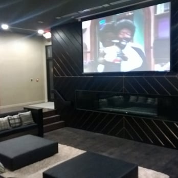 Xchange at Secaucus Junction - Sunken lounge with giant screen. - Apartments Near Me - Secaucus, New Jersey