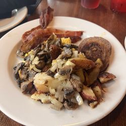 Frank and Linda's Restaurant - Bacon, sausage, potatoes with mushrooms and onions