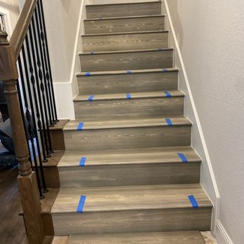 Superior Services - a staircase being painted - Flooring Near Me Superior Services - a staircase being painted - Flooring Near Me