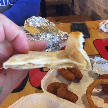 Cook Out - chicken quesadilla close to an empty buttered tortilla. - Fast Food Near Me - Lexington, Kentucky Cook Out - chicken quesadilla close to an empty buttered tortilla. - Fast Food Near Me - Lexington, Kentucky