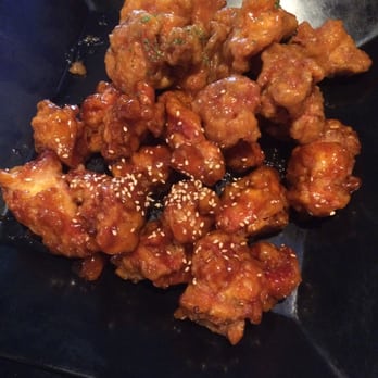 Pelicana Chicken - Flushing - Half spicy marinated and half garlic chicken.!!! Yummm - Korean Near Me - Flushing, New York Pelicana Chicken - Flushing - Half spicy marinated and half garlic chicken.!!! Yummm - Korean Near Me - Flushing, New York