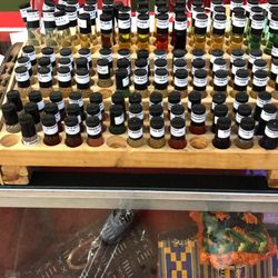 Frontline Books & Kultural Emporium - Perfumed and essential and body oils.