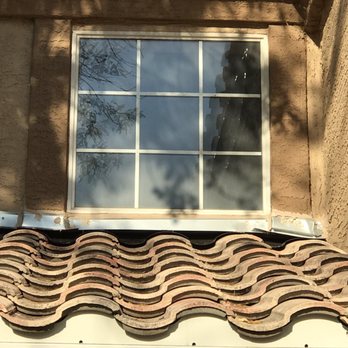 Johnson Roofing - Look at the lower right side and see what a poor job the did. After promised 4 times they would fix it they never called back. - Roofing Near Me - Mesa, Arizona