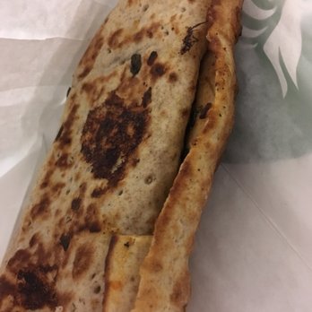 Starbucks - a close up of a flatbread sandwich - Coffee & Tea Near Me - Ottawa, Ontario Starbucks - a close up of a flatbread sandwich - Coffee & Tea Near Me - Ottawa, Ontario
