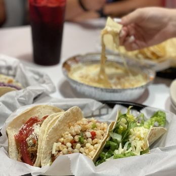 The Iron Daisy - a plate of tacos and chips - Mexican Near Me - Tallahassee, Florida The Iron Daisy - a plate of tacos and chips - Mexican Near Me - Tallahassee, Florida