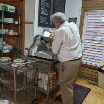 Heritage Bake Shoppe - Slicing cheese - Desserts Near Me - Virginia Beach, Virginia Heritage Bake Shoppe - Slicing cheese - Desserts Near Me - Virginia Beach, Virginia