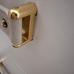 Closet Factory - Bedroom cabinet handle with hold drilled too large.