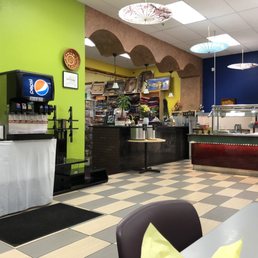 Nice buffet and open seating area. Nice Indian music playing softly. Nice buffet and open seating area. Nice Indian music playing softly.