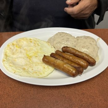 Big Nick's Coney Island - Pat's breakfast with eggs over hard, sausage, & biscuits with gravy. - American Near Me - Pontiac, Michigan Big Nick's Coney Island - Pat's breakfast with eggs over hard, sausage, & biscuits with gravy. - American Near Me - Pontiac, Michigan