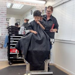 Classic Cuts Barbershop - My son getting his hair cut