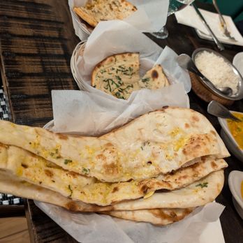 Sugandh Indian Restaurant & Bar - Naan galore. - Indian Near Me - Millbrae, California Sugandh Indian Restaurant & Bar - Naan galore. - Indian Near Me - Millbrae, California